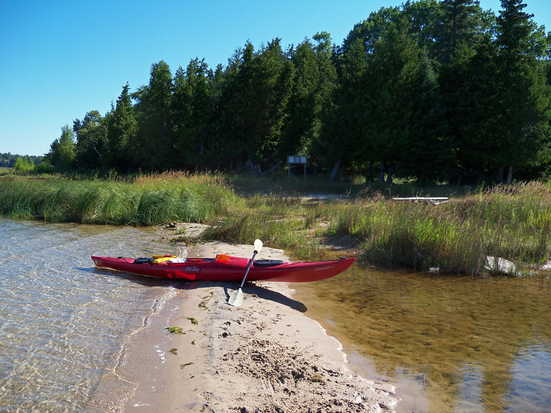 kayaking to government island north campsite in the les cheneaux islands